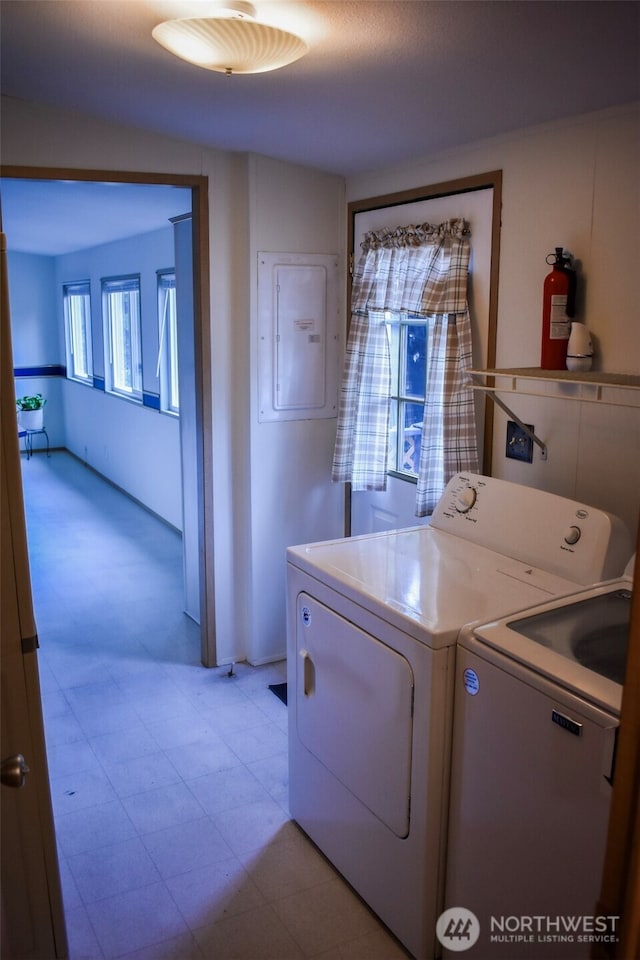 3060 NE Mcwilliams Rd Unit 54, Bremerton, WA 98311 - laundry area with washing machine and dryer, light floors, and electric panel