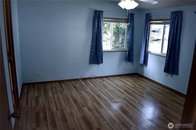 3060 NE Mcwilliams Rd Unit 54, Bremerton, WA 98311 - empty room with wood finished floors, a ceiling fan, and baseboards