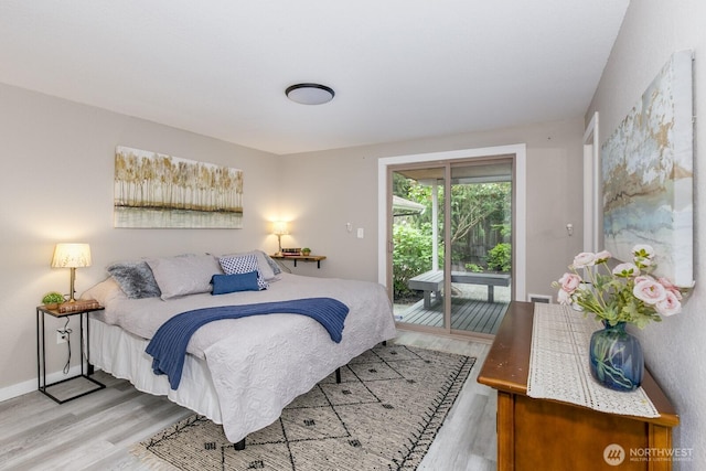 1728 106th St SW, Everett, WA 98204 - bedroom with access to outside and wood finished floors