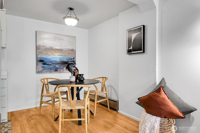 919 2nd Ave W Unit 103, Seattle, WA 98119 - dining area featuring light wood-style floors and baseboards