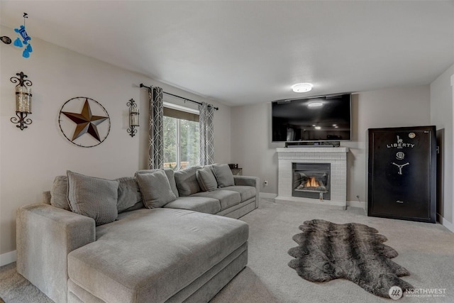 22506 SE 277th Pl, Maple Valley, WA 98038 - carpeted living area with a fireplace and baseboards