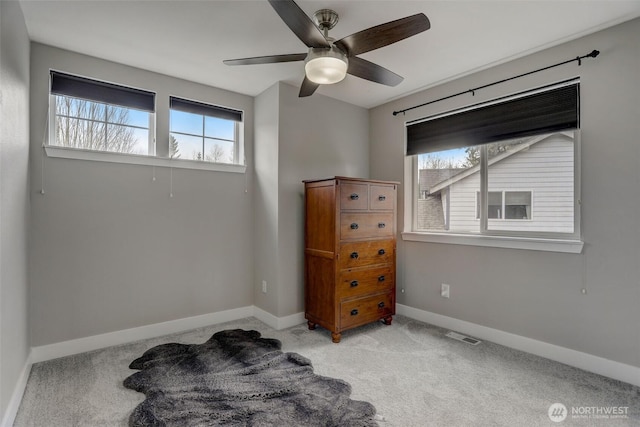 22506 SE 277th Pl, Maple Valley, WA 98038 - bedroom featuring multiple windows, baseboards, and carpet flooring