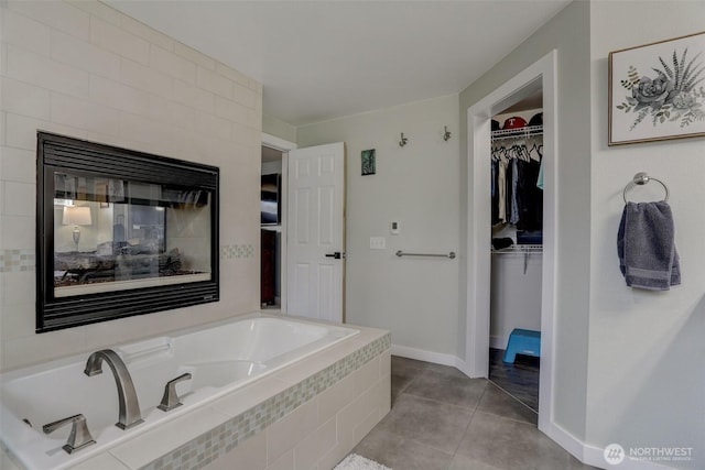 22506 SE 277th Pl, Maple Valley, WA 98038 - full bath featuring a garden tub, a spacious closet, baseboards, and tile patterned flooring