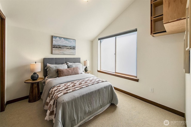 2648 NW 57th St Unit A, Seattle, WA 98107 - bedroom featuring baseboards, carpet floors, and vaulted ceiling