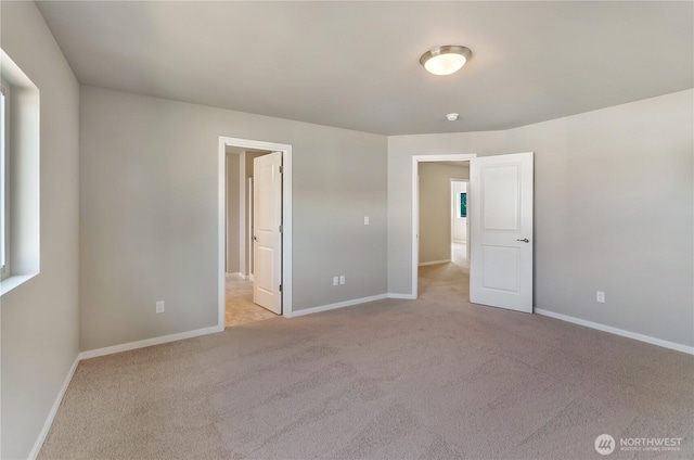 18226 37th Ave E, Tacoma, WA 98446 - unfurnished bedroom with carpet flooring and baseboards