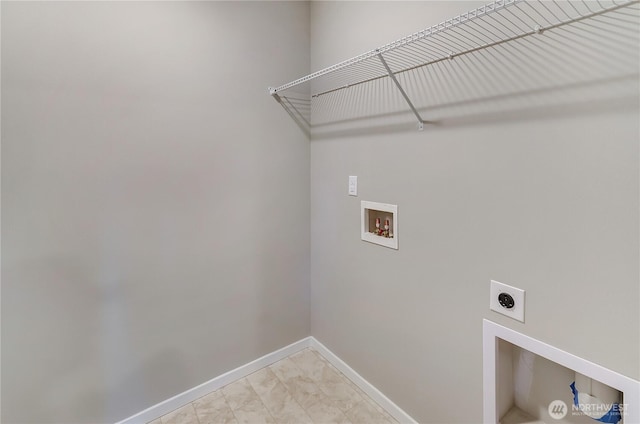 18226 37th Ave E, Tacoma, WA 98446 - laundry room with hookup for an electric dryer, hookup for a washing machine, baseboards, and light marble finish floors