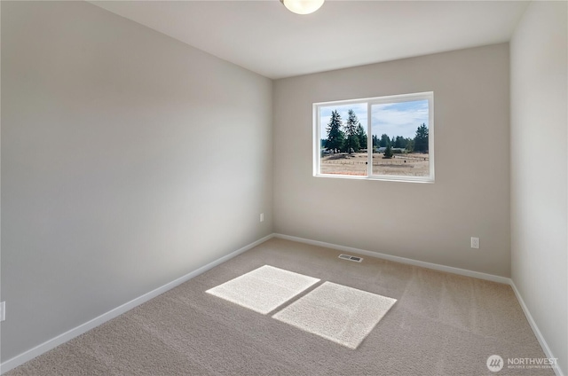 18226 37th Ave E, Tacoma, WA 98446 - carpeted empty room with baseboards
