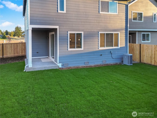 18226 37th Ave E, Tacoma, WA 98446 - back of property with crawl space and cooling unit