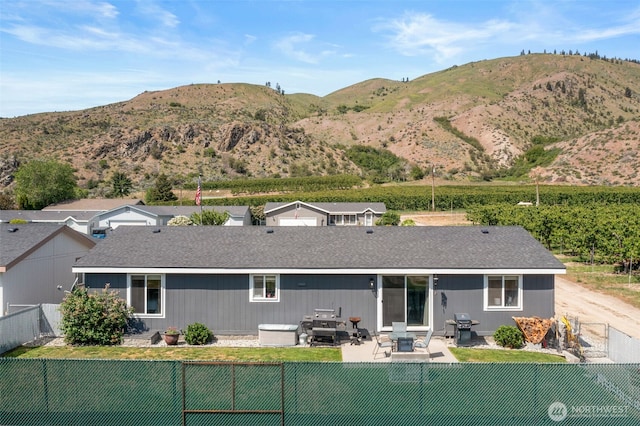 14617 Diamond Ave, Entiat, WA 98822 - rear view of house featuring a patio, a mountain view, and a shingled roof