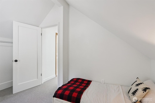 7511 230th Ave NE, Redmond, WA 98053 - bedroom with lofted ceiling and carpet flooring