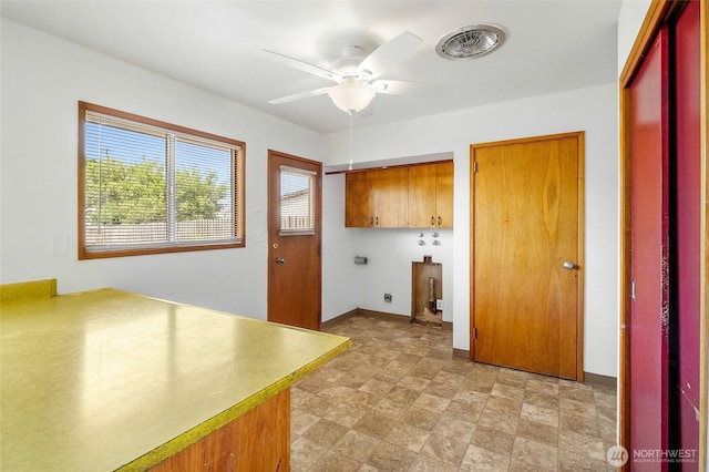 9023 Mcconnell Dr Unit B, Moses Lake, WA 98837 - washroom featuring cabinet space, hookup for an electric dryer, ceiling fan, and baseboards