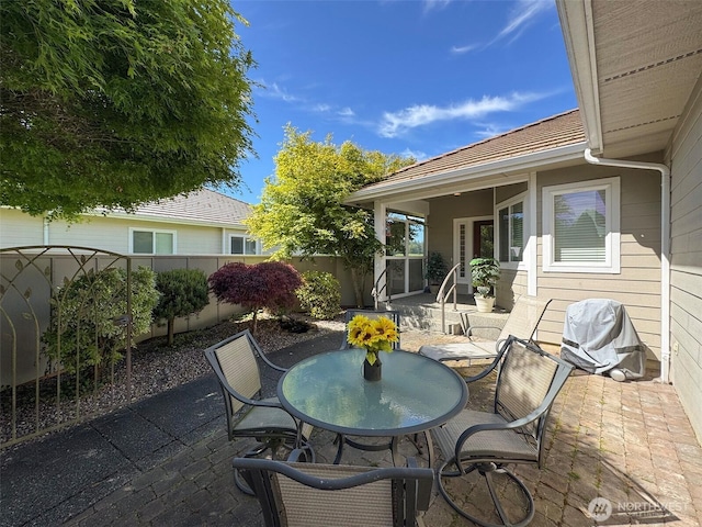 40 Cascadia Loop, Sequim, WA 98382 - fenced backyard with a patio and outdoor dining space