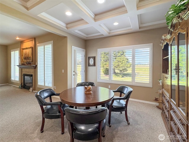 40 Cascadia Loop, Sequim, WA 98382 - dining area with light colored carpet, coffered ceiling, beamed ceiling, baseboards, and a fireplace with flush hearth