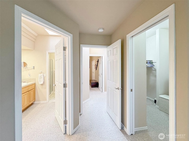 40 Cascadia Loop, Sequim, WA 98382 - corridor featuring light colored carpet and baseboards
