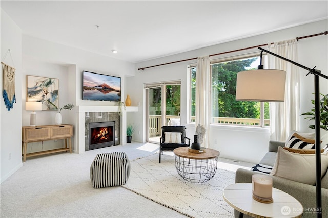 2141 NW Boulder Way Dr, Issaquah, WA 98027 - carpeted living room featuring a tile fireplace and baseboards
