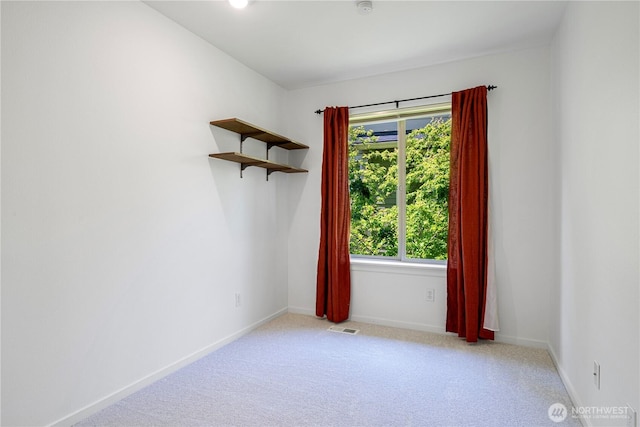 2141 NW Boulder Way Dr, Issaquah, WA 98027 - empty room with light colored carpet and baseboards
