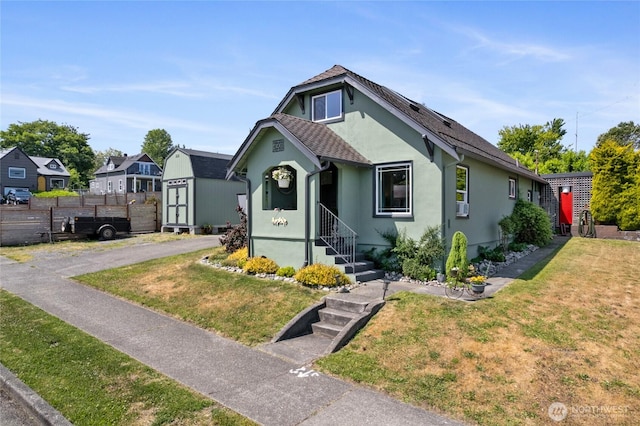 4908 N Winnifred, Ruston, WA 98407 - view of front of home featuring stucco siding and cooling unit