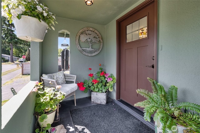 4908 N Winnifred, Ruston, WA 98407 - property entrance featuring covered porch and stucco siding