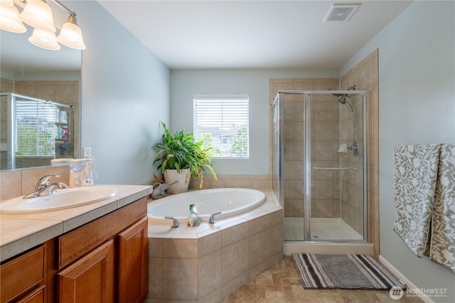 7615 14th St SE, Lake Stevens, WA 98258 - full bath with a bath, vanity, a shower stall, and tile patterned floors