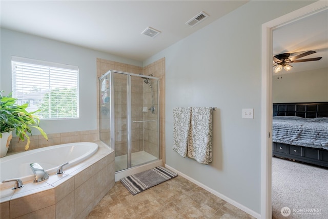 7615 14th St SE, Lake Stevens, WA 98258 - bathroom with connected bathroom, a garden tub, a stall shower, and ceiling fan