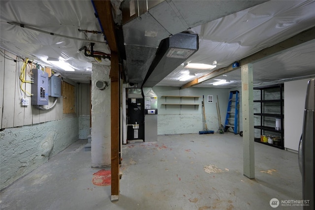 3536 Arbor St, Bellingham, WA 98229 - unfinished below grade area featuring electric panel, heating unit, and refrigerator