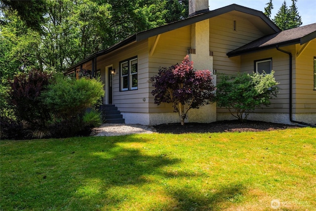 3536 Arbor St, Bellingham, WA 98229 - view of side of home with a yard and a chimney
