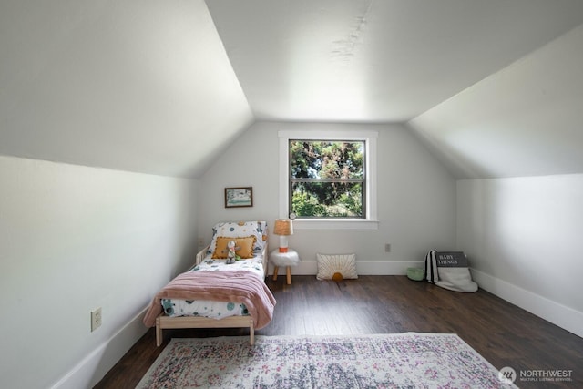 2560 Gilman Dr W, Seattle, WA 98119 - bedroom featuring vaulted ceiling, wood finished floors, and baseboards