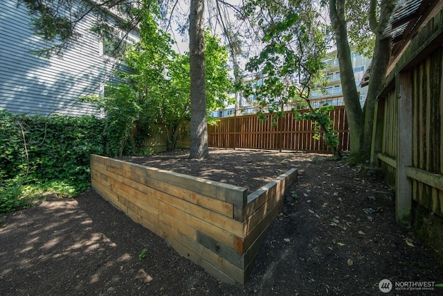 2560 Gilman Dr W, Seattle, WA 98119 - wooden terrace featuring a fenced backyard