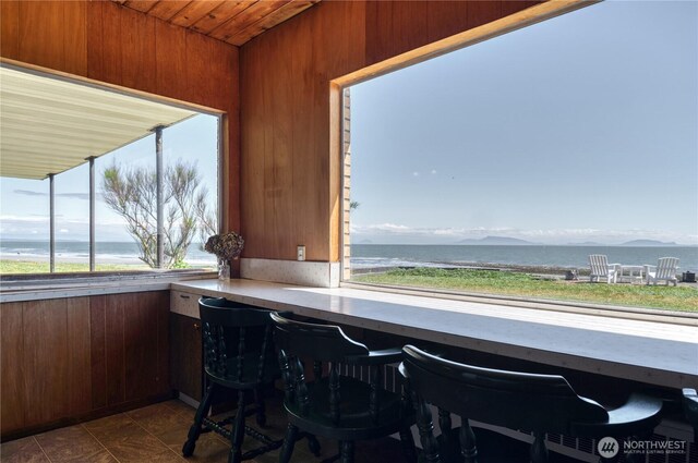 1811 Edwards Dr, Point Roberts, WA 98281 - interior space featuring healthy amount of natural light, a water view, and wooden walls