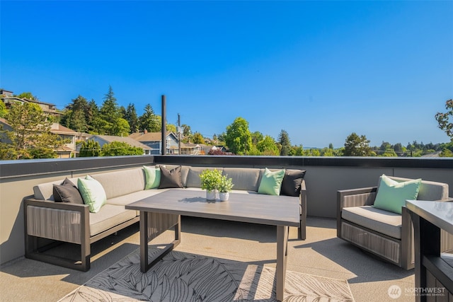 3240 32nd Ave W Unit B, Seattle, WA 98199 - deck with outdoor lounge area and a patio