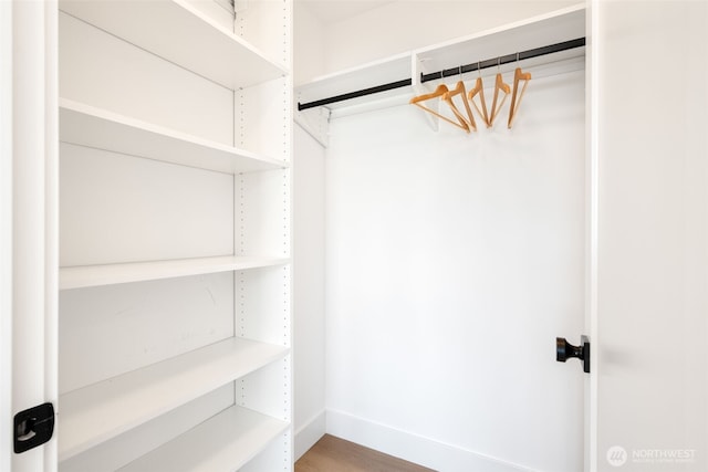 3240 32nd Ave W Unit B, Seattle, WA 98199 - walk in closet with wood finished floors