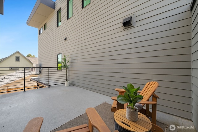 3240 32nd Ave W Unit B, Seattle, WA 98199 - view of patio with a balcony