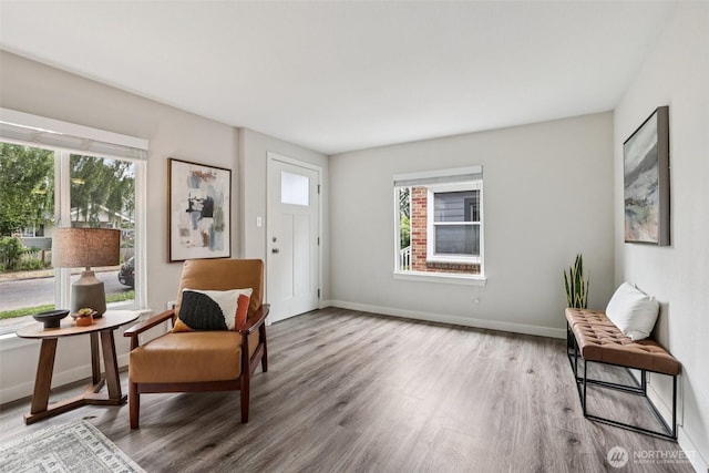 1022 N Anderson St, Tacoma, WA 98406 - sitting room with wood finished floors and baseboards