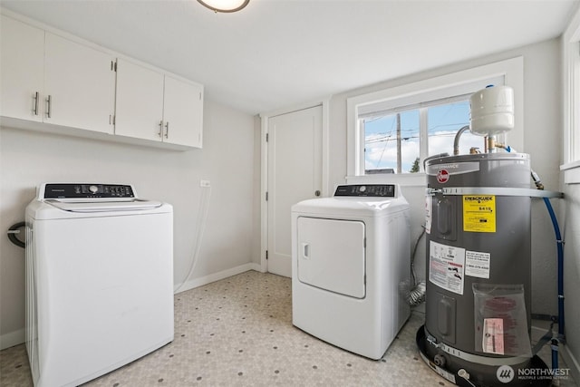 1022 N Anderson St, Tacoma, WA 98406 - laundry area featuring electric water heater, washing machine and dryer, cabinet space, and light floors