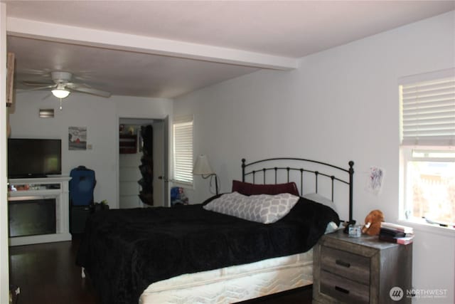 418 SW Canyon Loop, Winlock, WA 98596 - bedroom featuring beamed ceiling and dark wood-style flooring