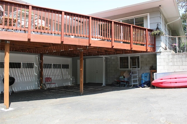 418 SW Canyon Loop, Winlock, WA 98596 - rear view of property with an attached garage and a deck