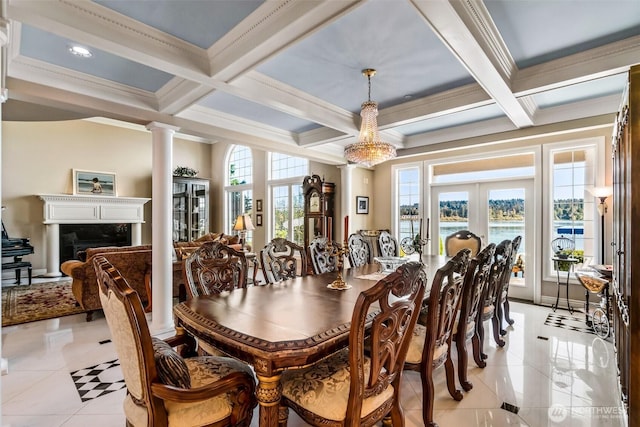 17765 Beach Dr NE, Lake Forest Park, WA 98155 - dining space featuring crown molding, coffered ceiling, beamed ceiling, plenty of natural light, and ornate columns