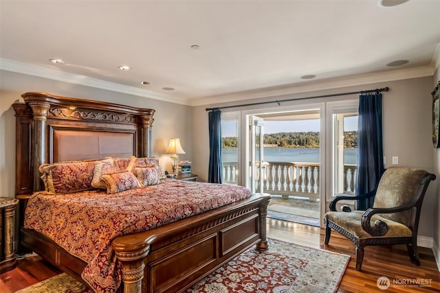17765 Beach Dr NE, Lake Forest Park, WA 98155 - bedroom with access to exterior, wood finished floors, crown molding, and a water view