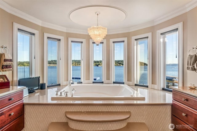 17765 Beach Dr NE, Lake Forest Park, WA 98155 - full bathroom featuring a garden tub, a chandelier, crown molding, vanity, and a water view