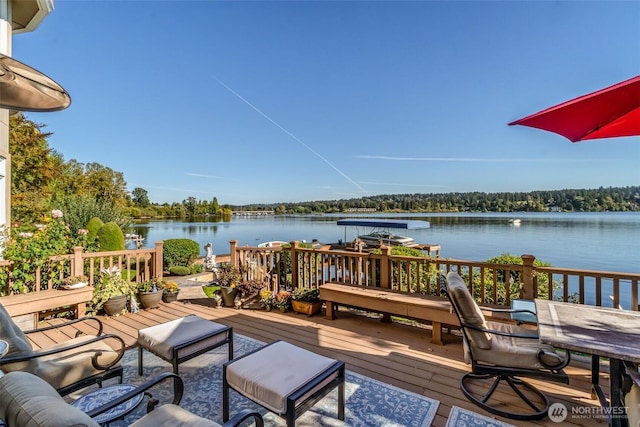 17765 Beach Dr NE, Lake Forest Park, WA 98155 - wooden deck with a water view