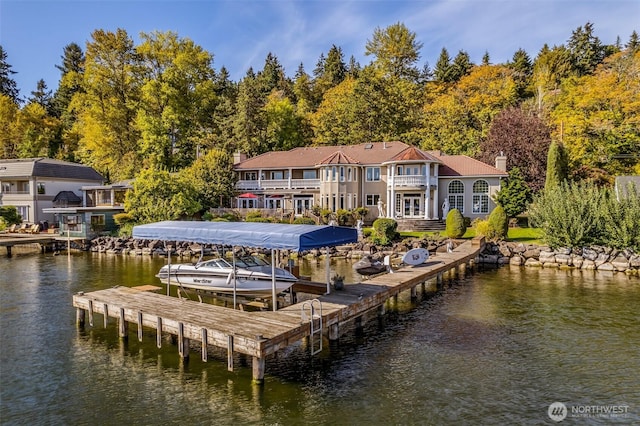 17765 Beach Dr NE, Lake Forest Park, WA 98155 - dock area featuring a water view and a balcony