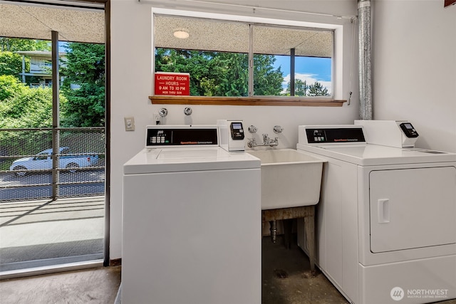 3814 11th Ave W Apt 23, Seattle, WA 98119 - shared laundry featuring washing machine and clothes dryer