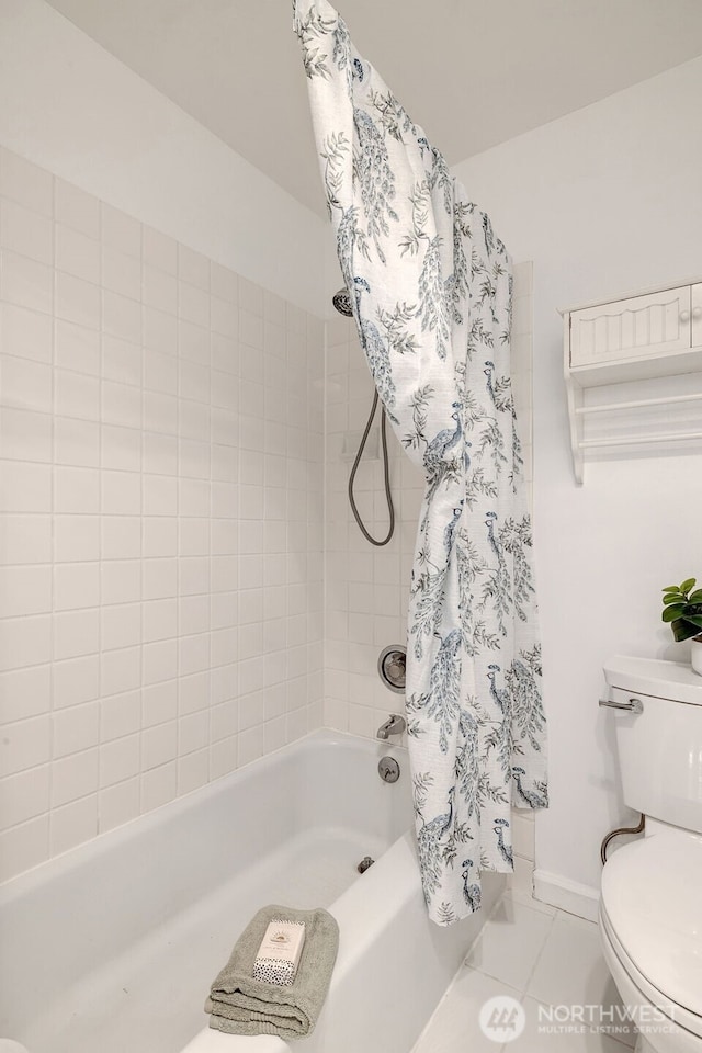 3814 11th Ave W Apt 23, Seattle, WA 98119 - full bath featuring shower / bath combo, toilet, and tile patterned flooring
