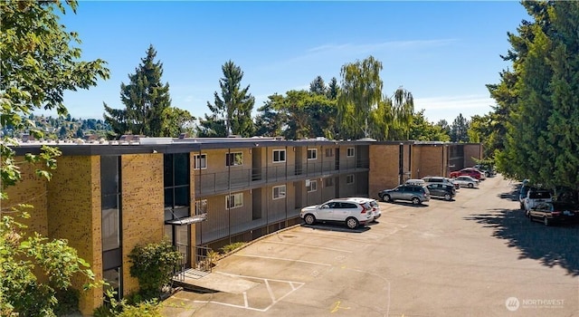 3814 11th Ave W Apt 23, Seattle, WA 98119 - view of building exterior featuring uncovered parking