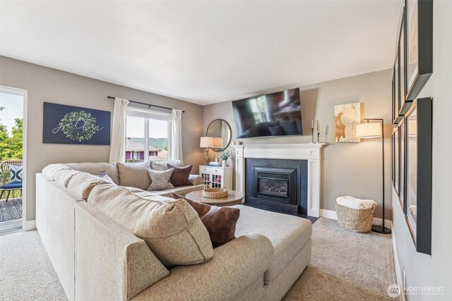 26820 NE 163rd St, Duvall, WA 98019 - carpeted living room with a tile fireplace and baseboards