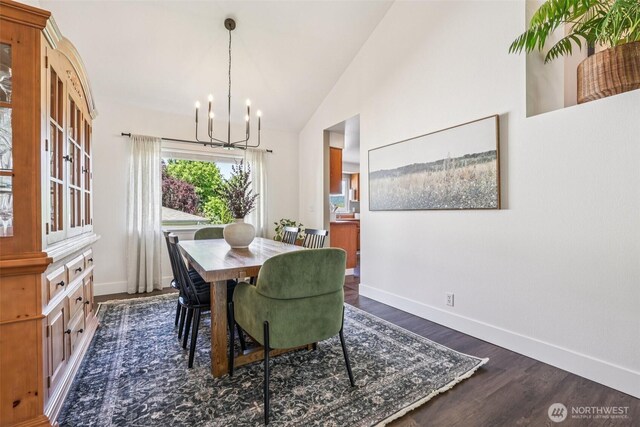 26820 NE 163rd St, Duvall, WA 98019 - dining space with a chandelier, wood finished floors, baseboards, and vaulted ceiling