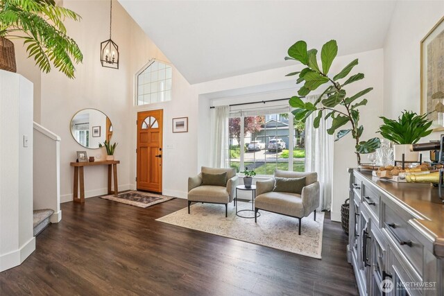 26820 NE 163rd St, Duvall, WA 98019 - entrance foyer with high vaulted ceiling, dark wood-style flooring, baseboards, and a chandelier