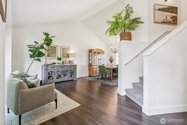 26820 NE 163rd St, Duvall, WA 98019 - living area with stairs, a chandelier, dark wood finished floors, baseboards, and high vaulted ceiling