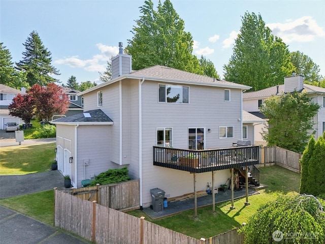 26820 NE 163rd St, Duvall, WA 98019 - rear view of property featuring a chimney, a wooden deck, stairway, and asphalt driveway