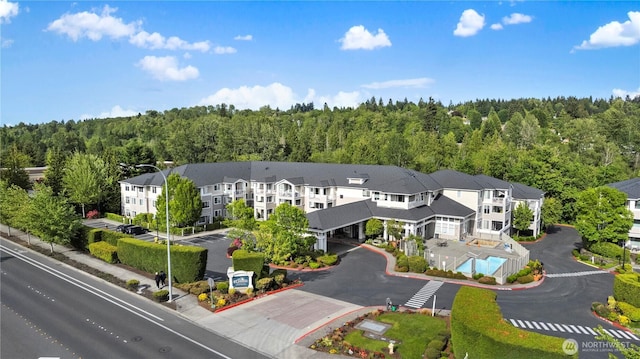 2220 132nd Ave SE Unit A220, Bellevue, WA 98005 - bird's eye view of a heavily wooded area and a pool area